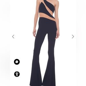 Norma Kamali jumpsuit. Brand new with tags. Size small. Smoke free home.